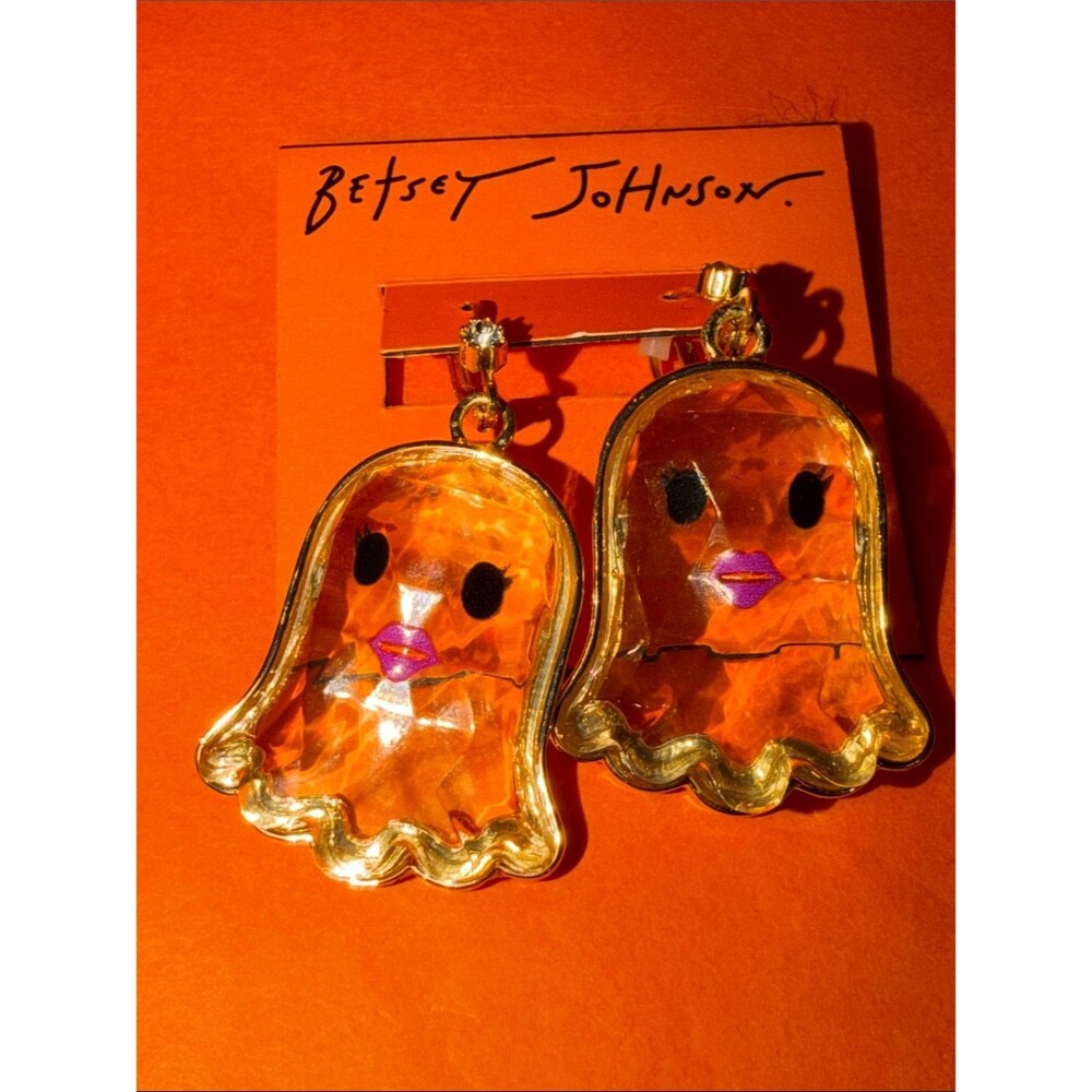 NWT. Betsey Johnson clear see thru Ghost Drop Earrings with gold accents.